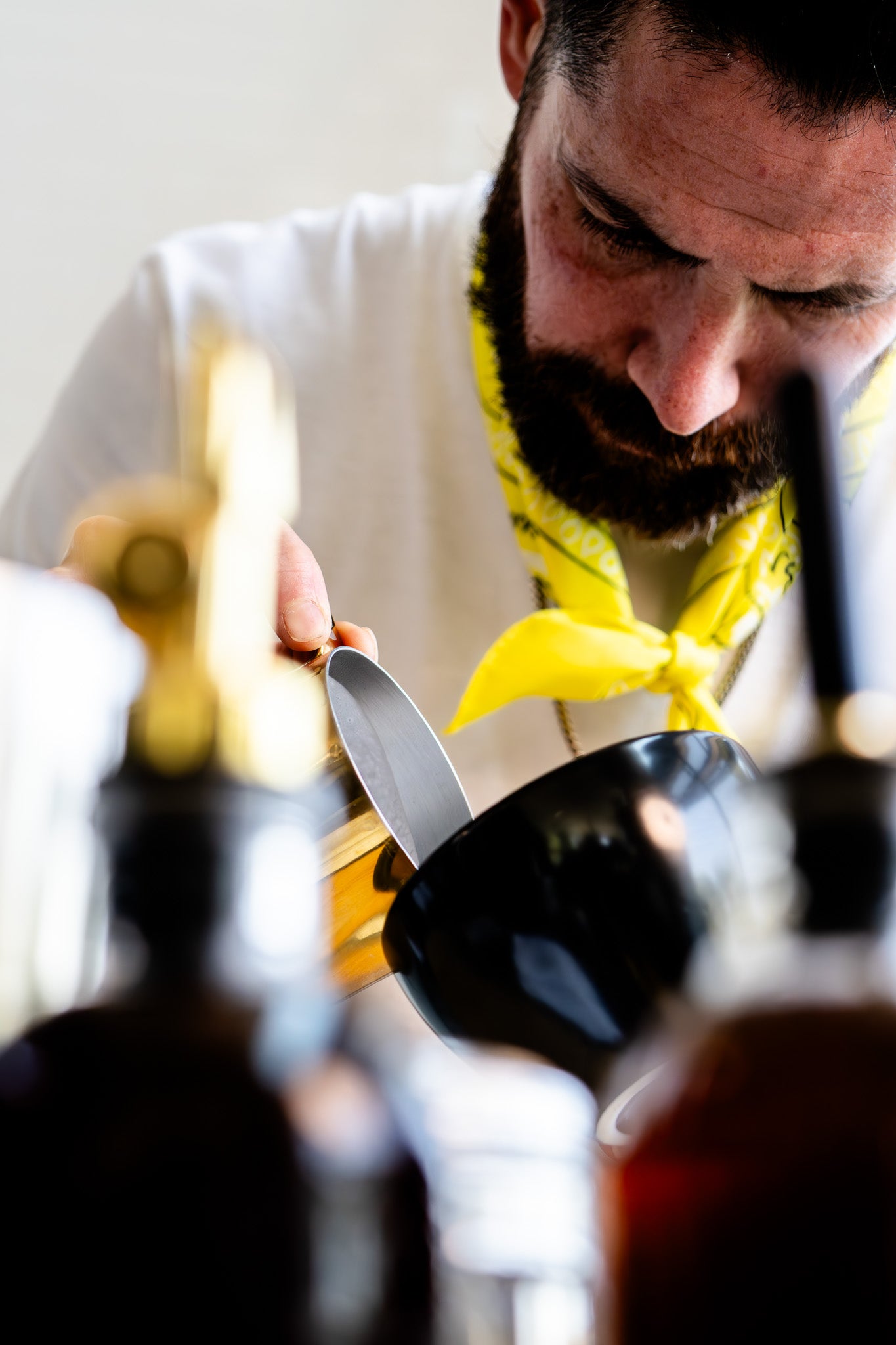 image of barista pouring milk into a cup