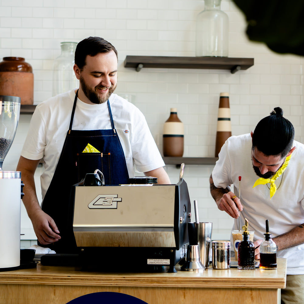 image of owners making coffee