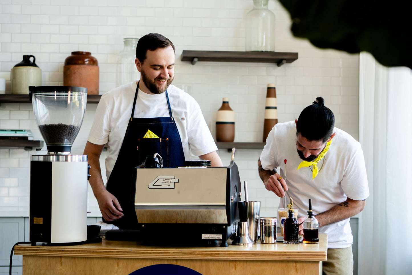 image of owners making coffee