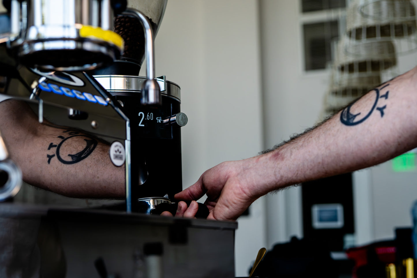 image of barista dialing in espresso 